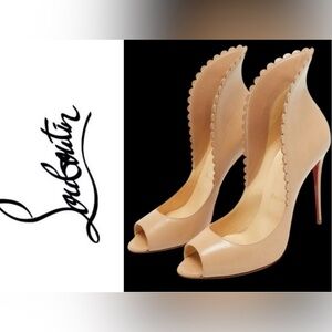 Christian Louboutin Pijiona flared collar heels and cosmetic case